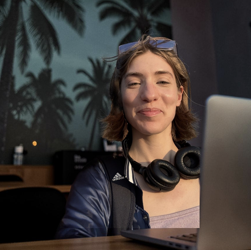 Shannon working at a laptop